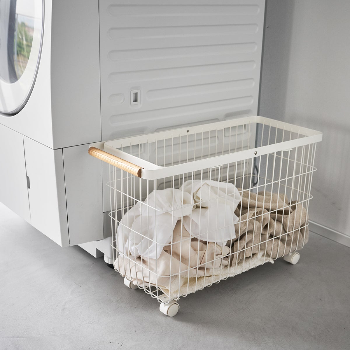 Yamazaki Tosca Rolling Laundry Basket | The Container Store